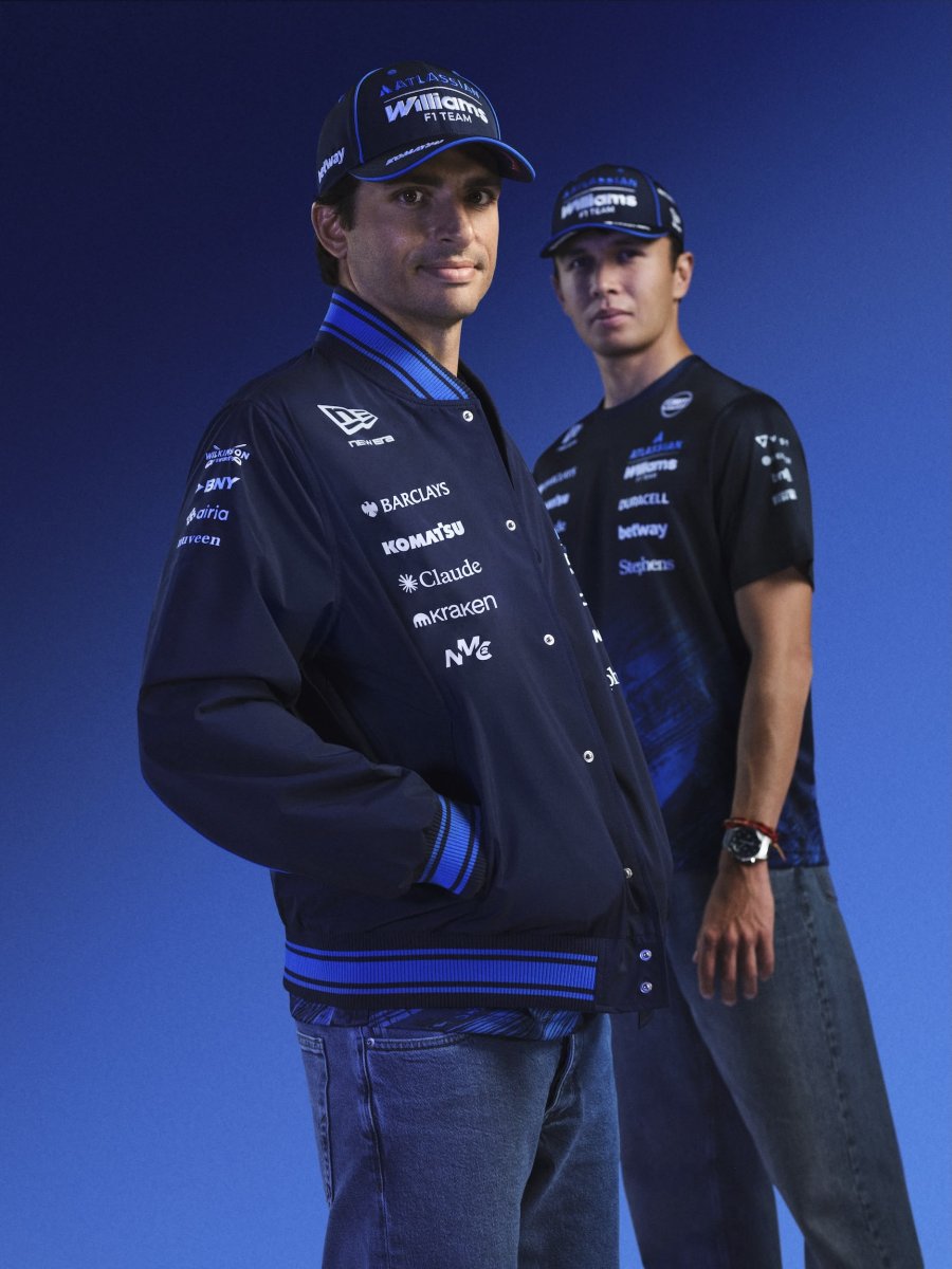 WANTAGE, ENGLAND - FEBRUARY 03: Carlos Sainz of Spain and Williams and Alexander Albon of Thailand and Williams pose for a photo during the Atlassian Williams F1 Team Launch on February 03, 2026 in Wantage, England.  (Photo by Atlassian Williams F1 Team)