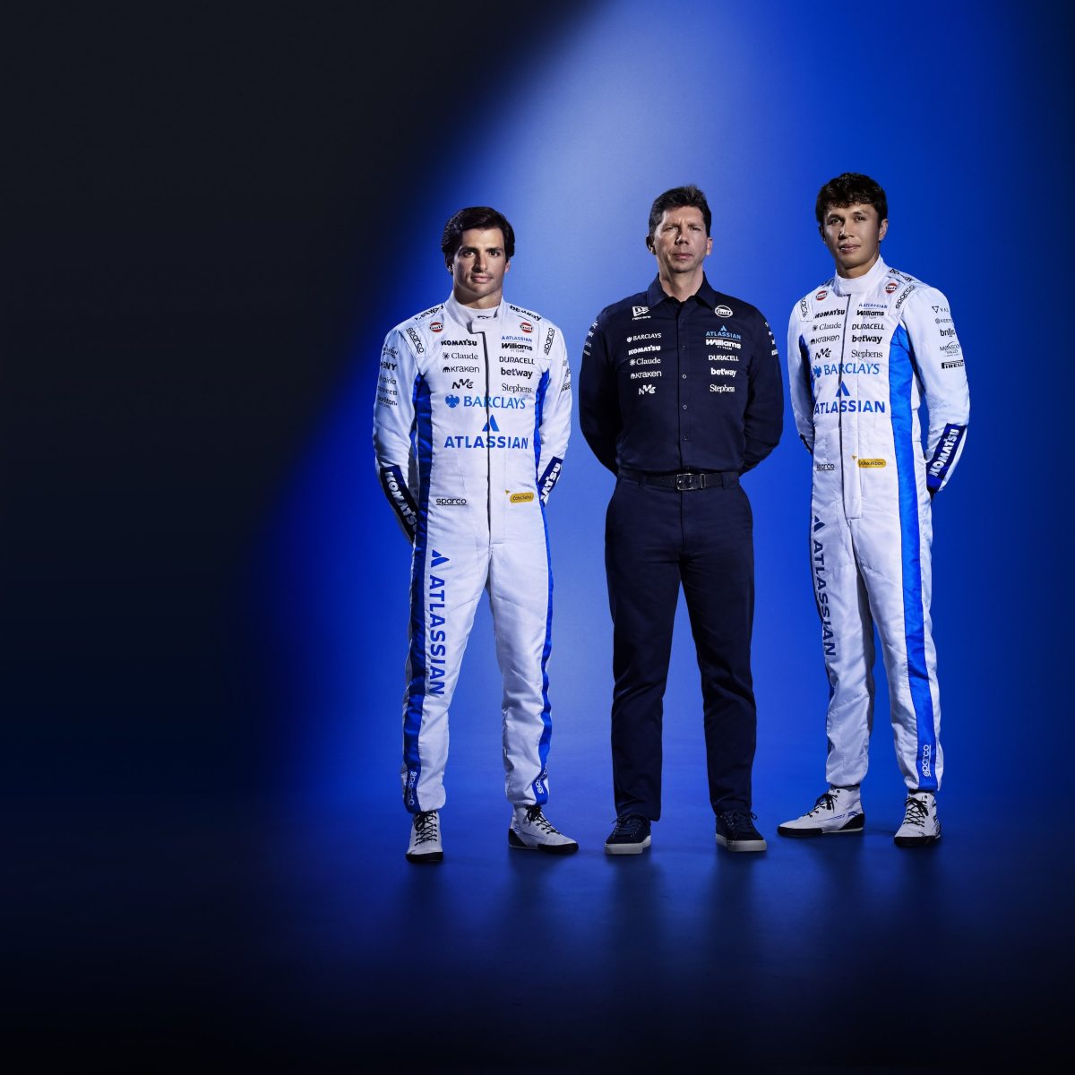 WANTAGE, ENGLAND - FEBRUARY 03: Carlos Sainz of Spain and Williams, James Vowles, Team Principal of Williams and Alexander Albon of Thailand and Williams pose for a photo during the Atlassian Williams F1 Team Launch on February 03, 2026 in Wantage, England.  (Photo by Atlassian Williams F1 Team)