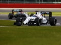 Silverstone, Northamptonshire, UK.Tuesday 12 July 2016.Alex Lynn, Williams FW38 Mercedes, leads Esteban Ocon, Mercedes F1 W07 Hybrid. Photo: Zak Mauger/Wiliams F1ref: Digital Image _79P9393